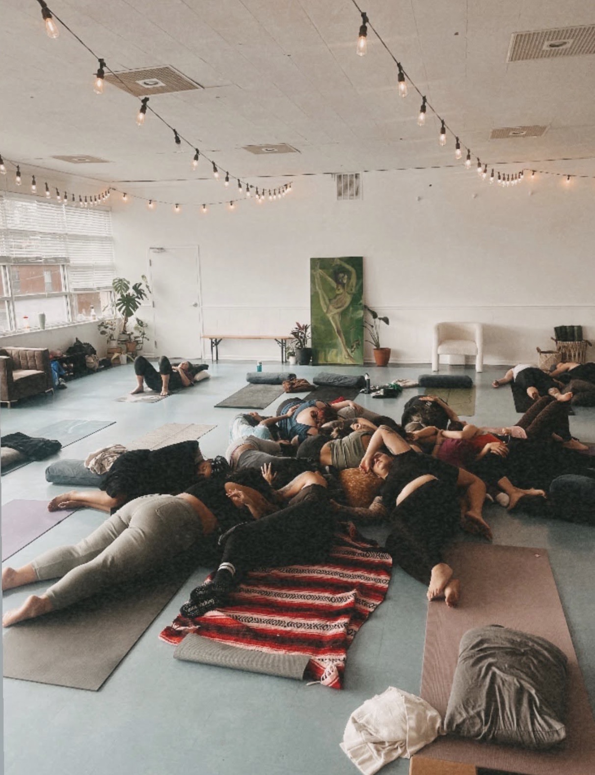 Guests resting together during a group wellness session