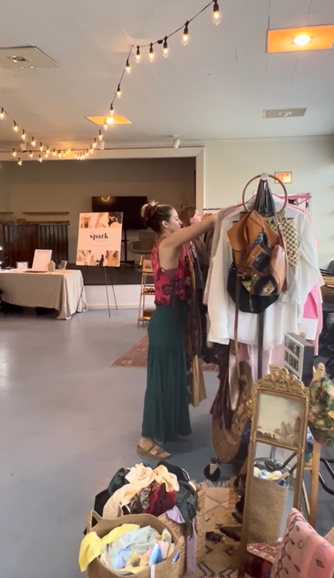 Local maker stalls and string lights at a Savannah market TEMPLE took part in