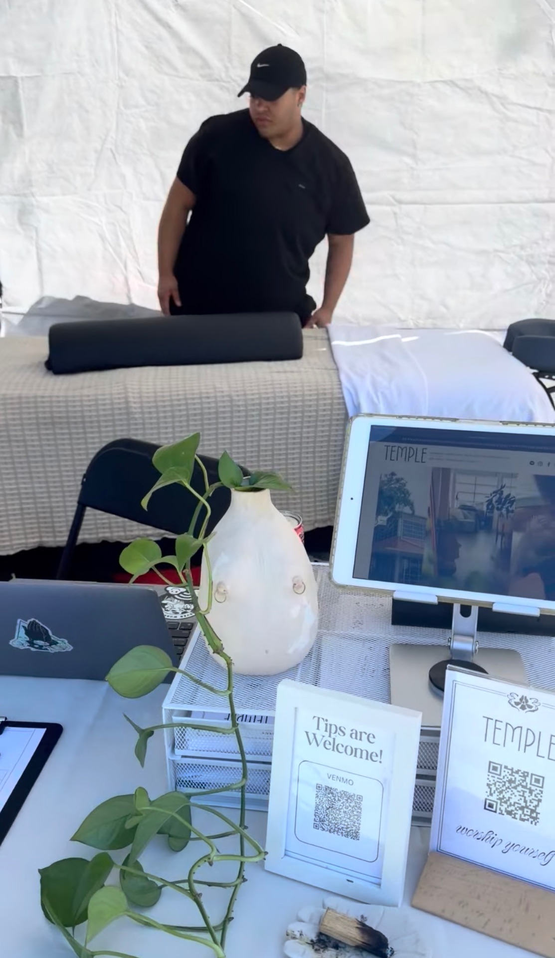 TEMPLE massage tent set up at an outdoor Savannah event