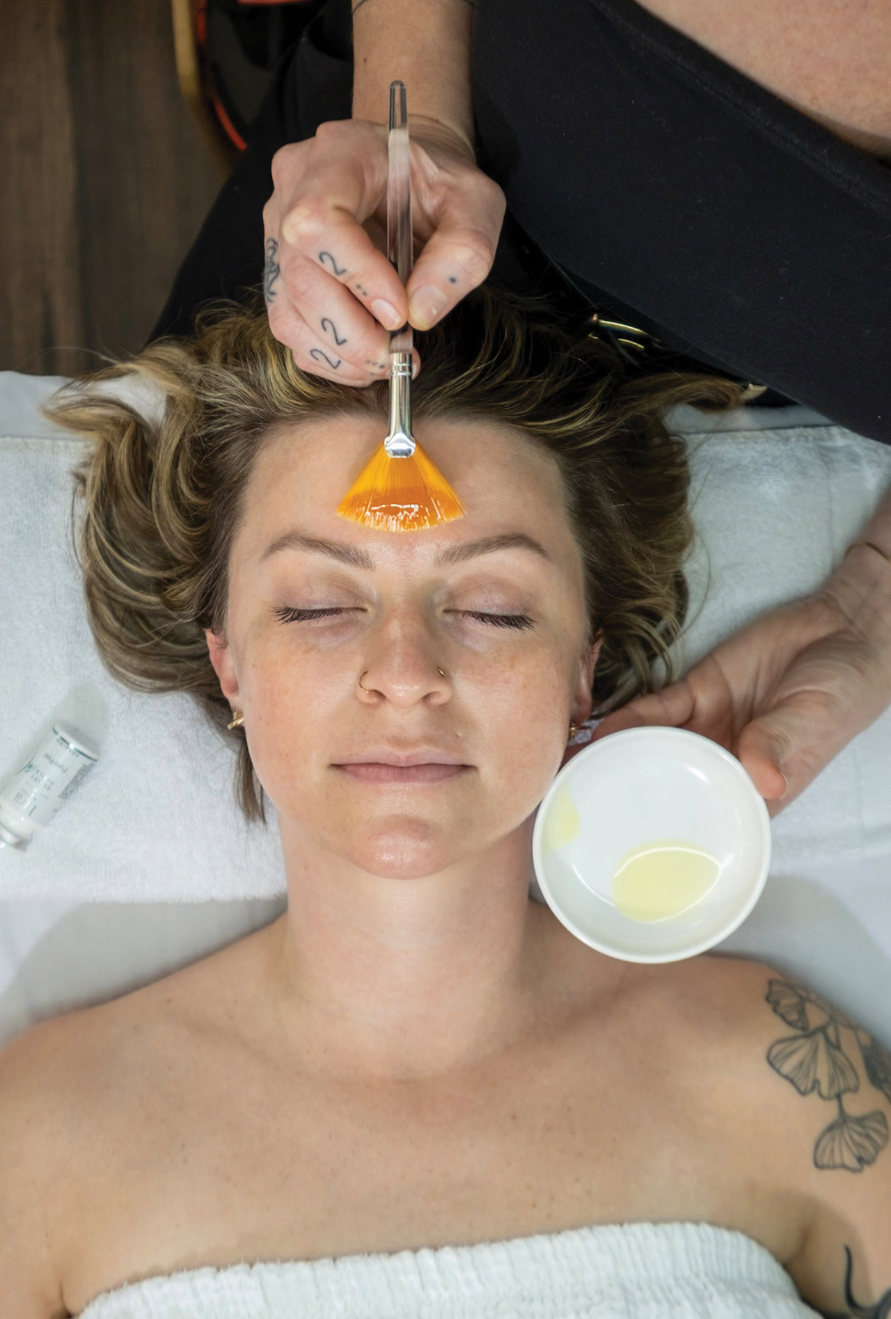 A TEMPLE client receiving a facial, featured in Savannah Magazine